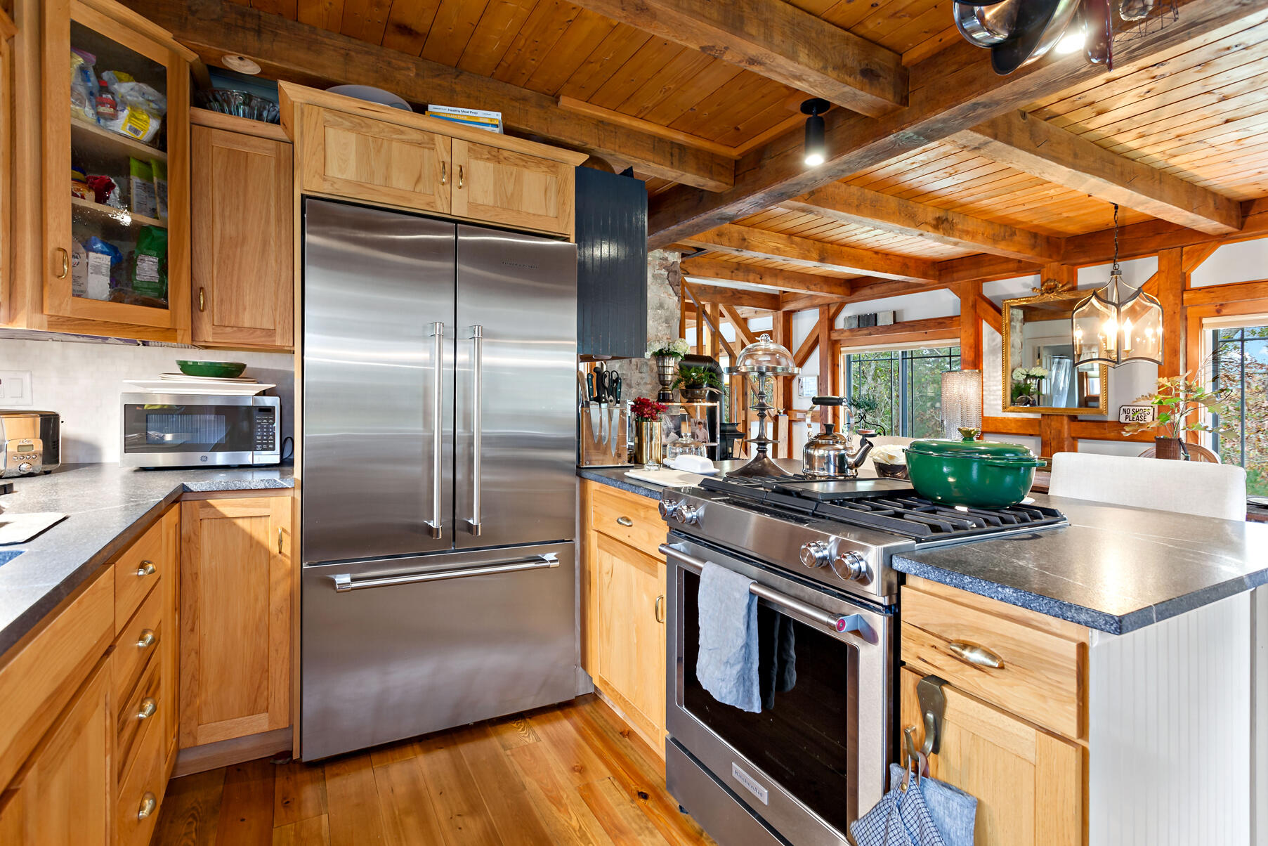 18 Evsun Drive Sandwich, MA 02563 - Photo 14 of 39 a kitchen with stainless steel appliances granite countertop a refrigerator a stove and a sink