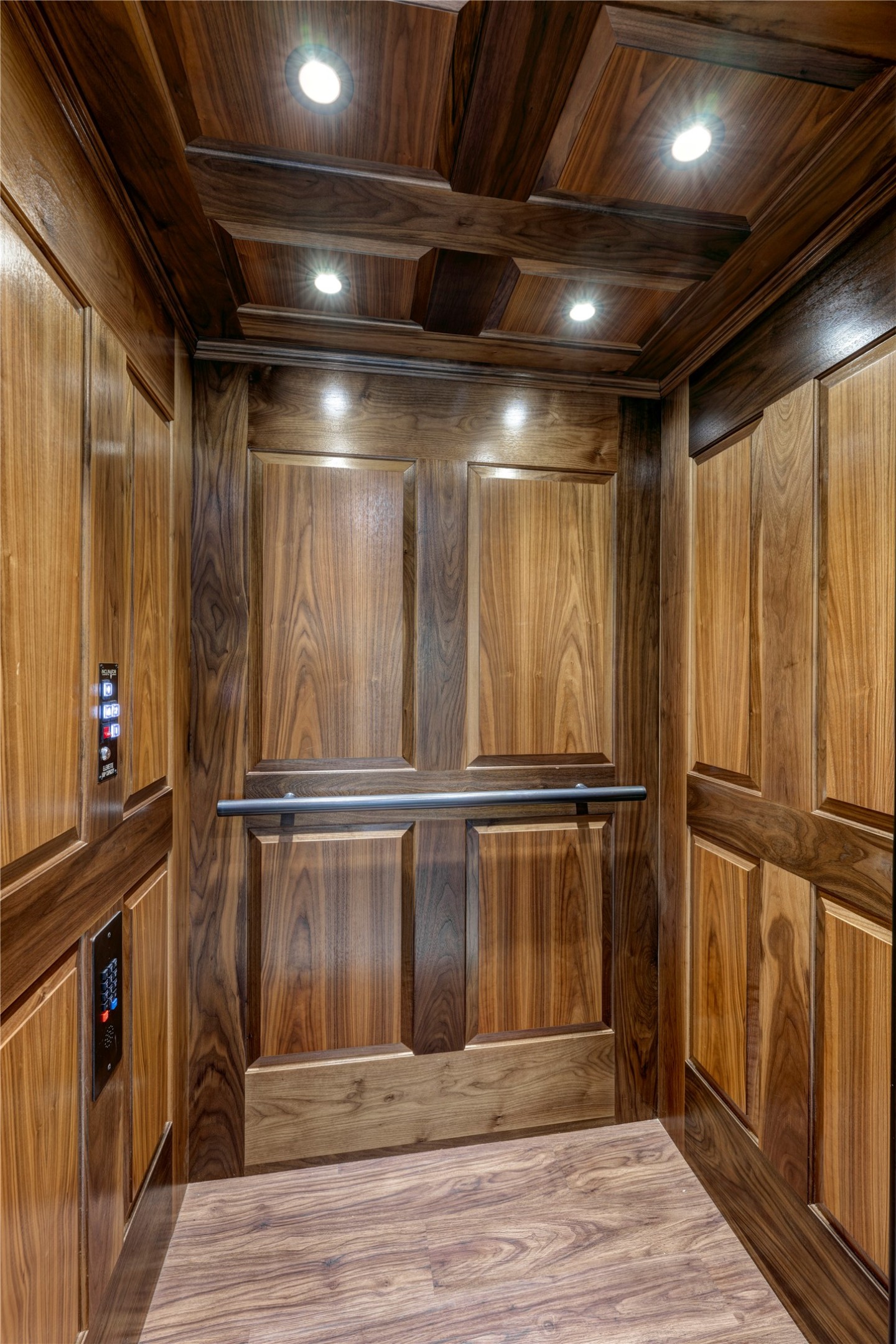 201 Vanderpool Lane, Unit 130 Houston, TX 77024 - Photo 20 of 41 The elevator adds a layer of luxury and accessibility to the home. The cab includes rich, polished wood paneling in a shaker-style design.
