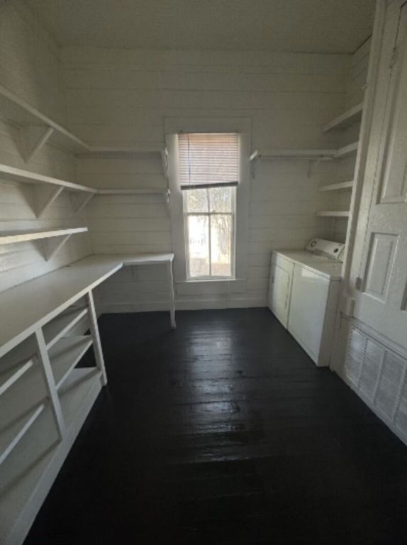 302 South Burleson Street Kyle, TX 78640 - Photo 11 of 18 a view of room with window and hardwood floor