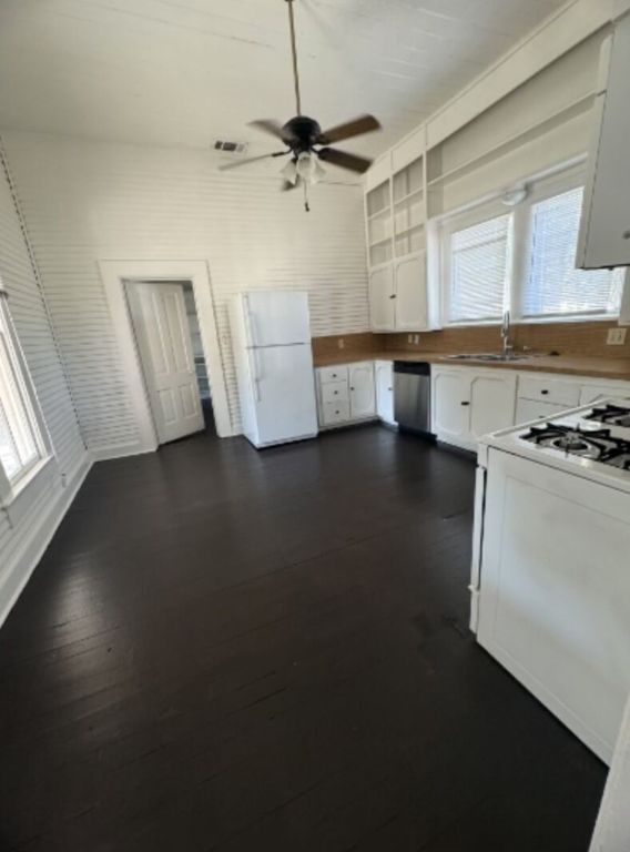 302 South Burleson Street Kyle, TX 78640 - Photo 13 of 18 a view of an empty room with a window