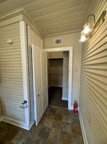 a view of a porch with a door