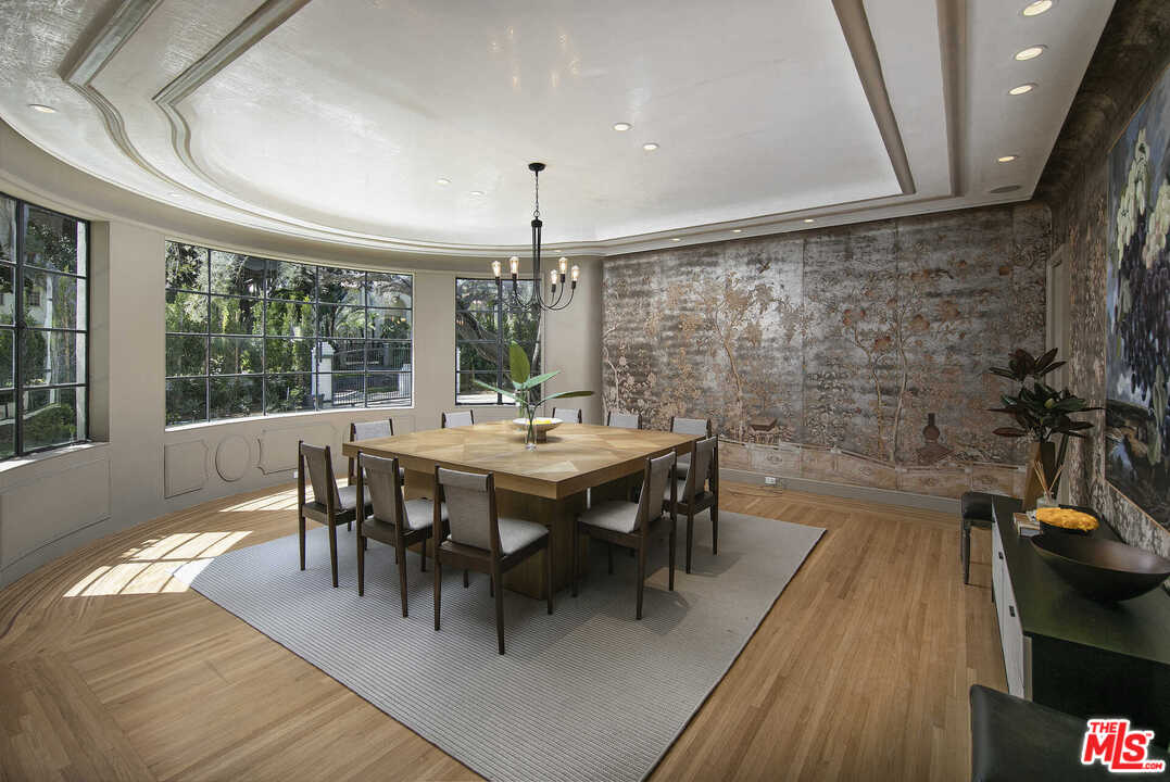 910 North Rexford Drive Beverly Hills, CA 90210 - Photo 10 of 32 a view of a dining room with furniture window and outside view