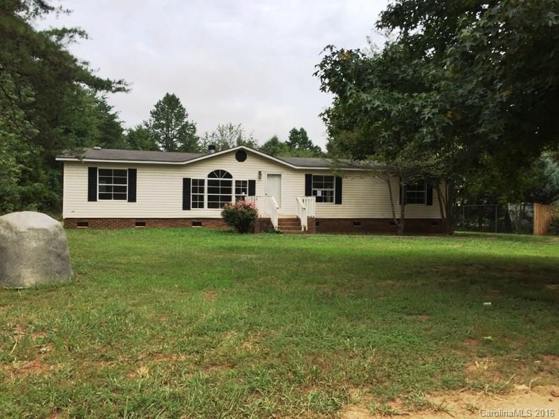 270 Freeze Meadows Road China Grove, NC 28023 - Photo 1 of 7 a front view of house with yard and green space