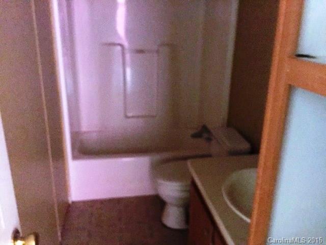 270 Freeze Meadows Road China Grove, NC 28023 - Photo 7 of 7 a bathroom with a tub