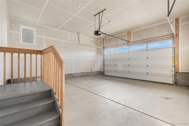 a view of a room with cabinet and stairs