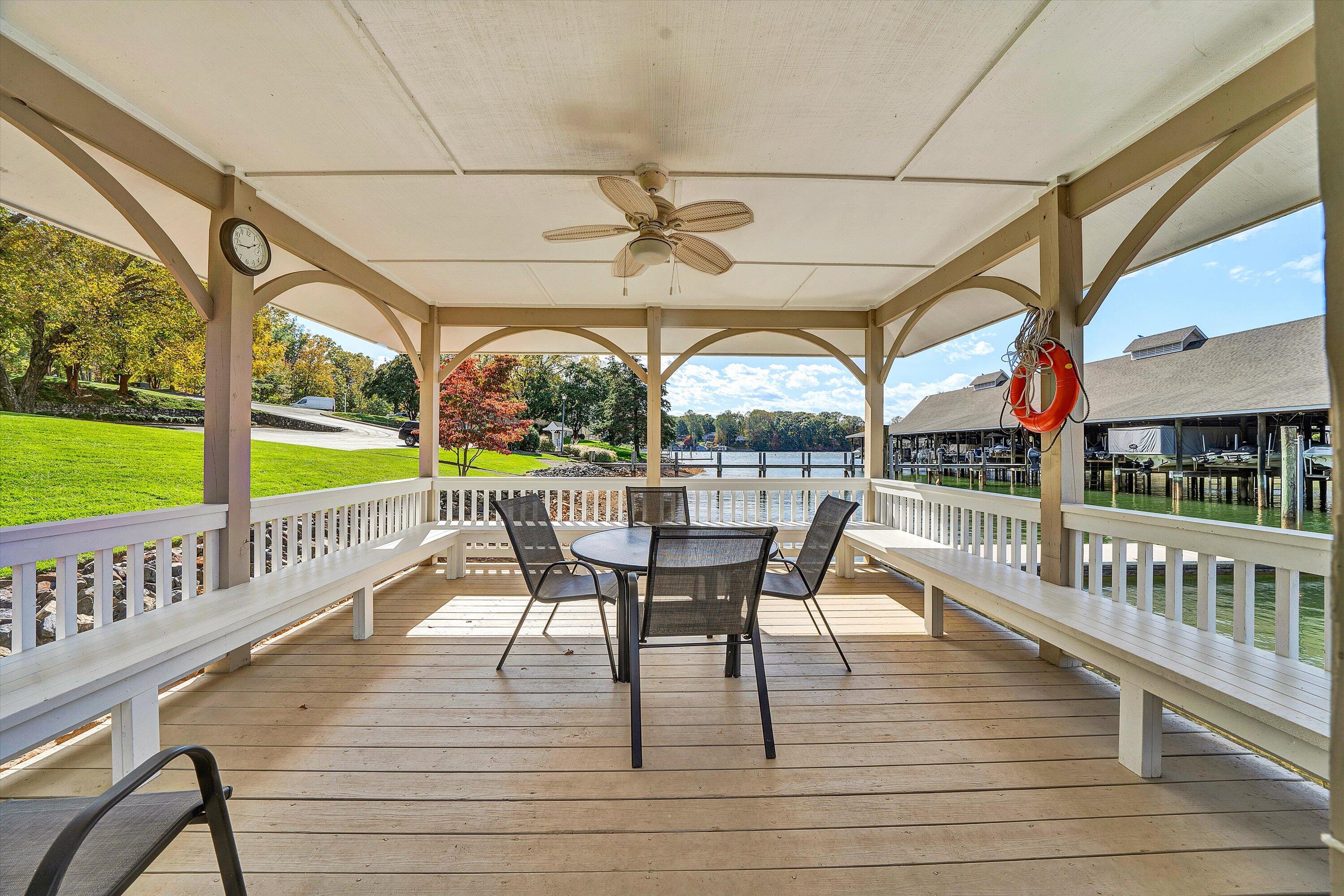 410 Marina Bay Drive, Unit 102 Penhook, VA 24137 - Photo 29 of 38 an outdoor view from deck with seating area