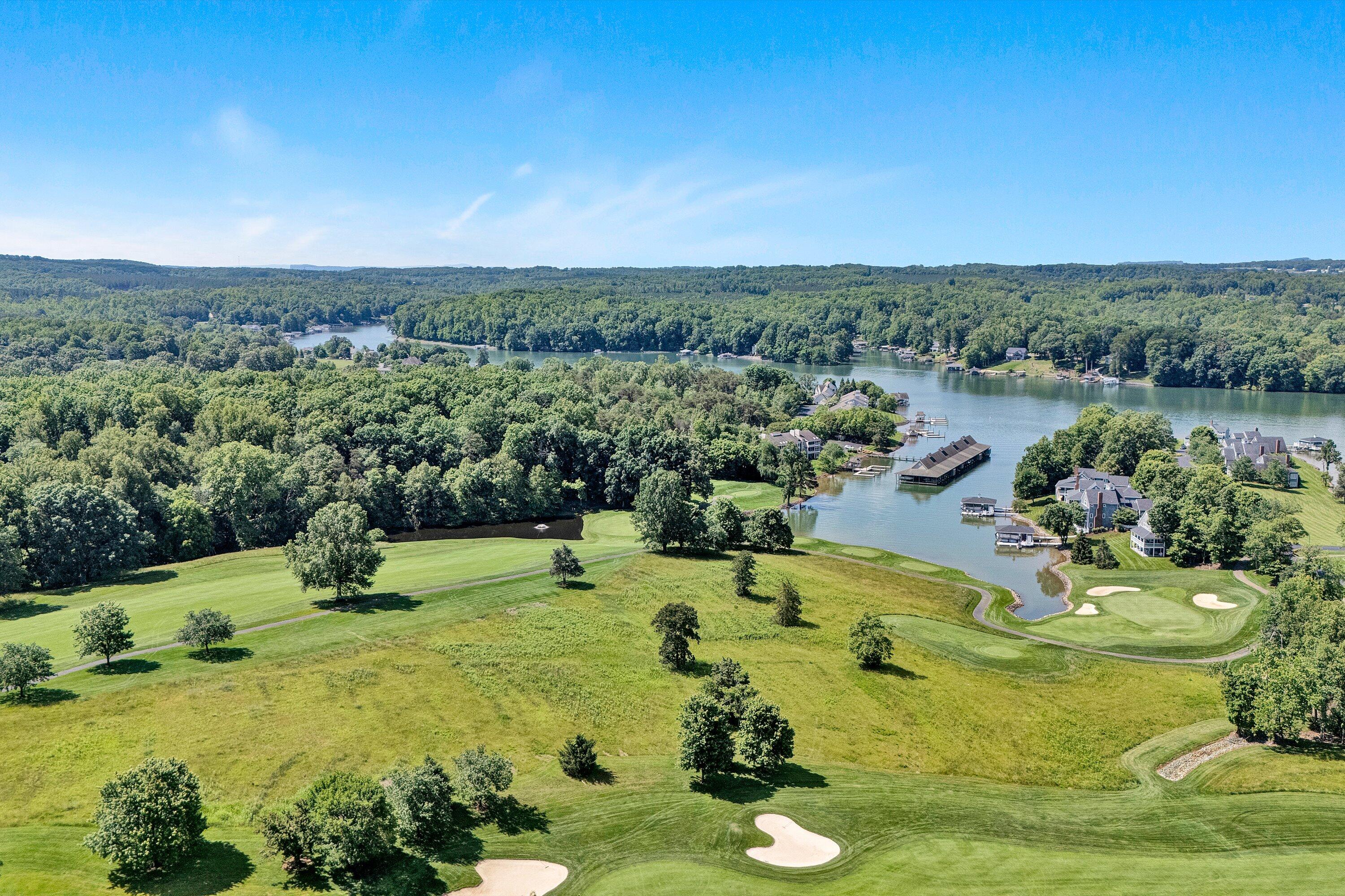 410 Marina Bay Drive, Unit 102 Penhook, VA 24137 - Photo 36 of 38 an aerial view of a houses with yard