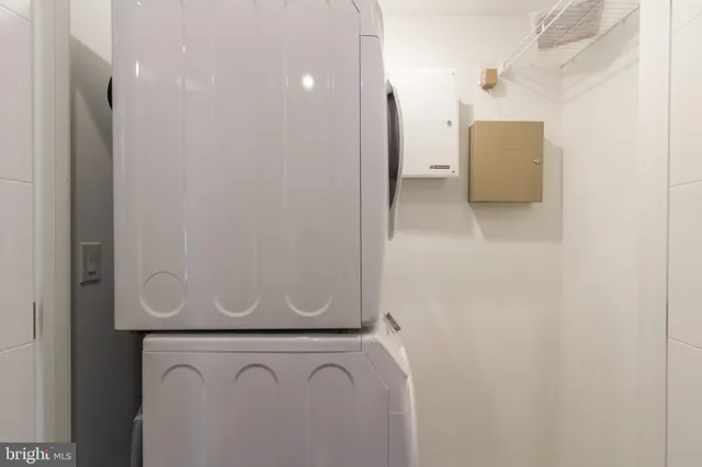 a bathroom with a toilet a sink and shower