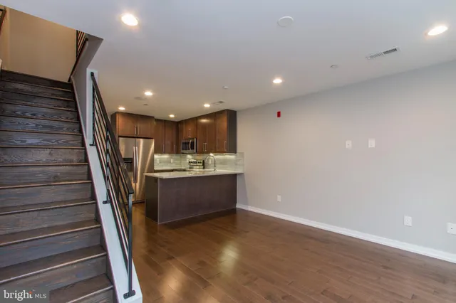 a view of entryway with wooden floor