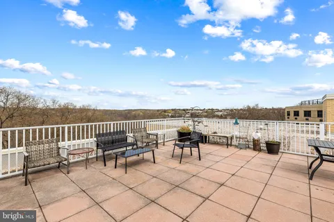 a view of a terrace with furniture
