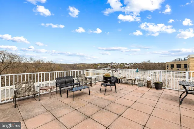 a view of a terrace with furniture