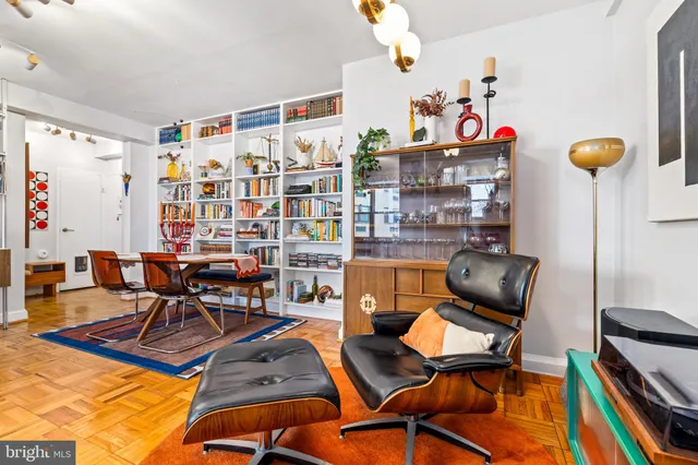 a work room with furniture and gym equipment