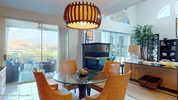 a very nice looking dining room with a table and chairs