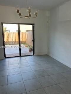 11781 Southwest 245 Terrace, Unit 11781 Homestead, FL 33032 - Photo 12 of 14 a view of an entryway with a window