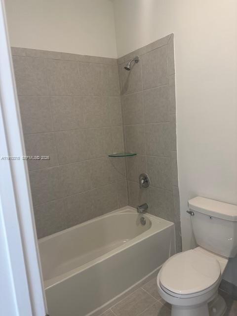 11781 Southwest 245 Terrace, Unit 11781 Homestead, FL 33032 - Photo 3 of 14 a white bath tub sitting next to a white toilet