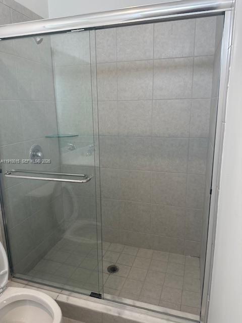 11781 Southwest 245 Terrace, Unit 11781 Homestead, FL 33032 - Photo 5 of 14 a bathroom with a shower