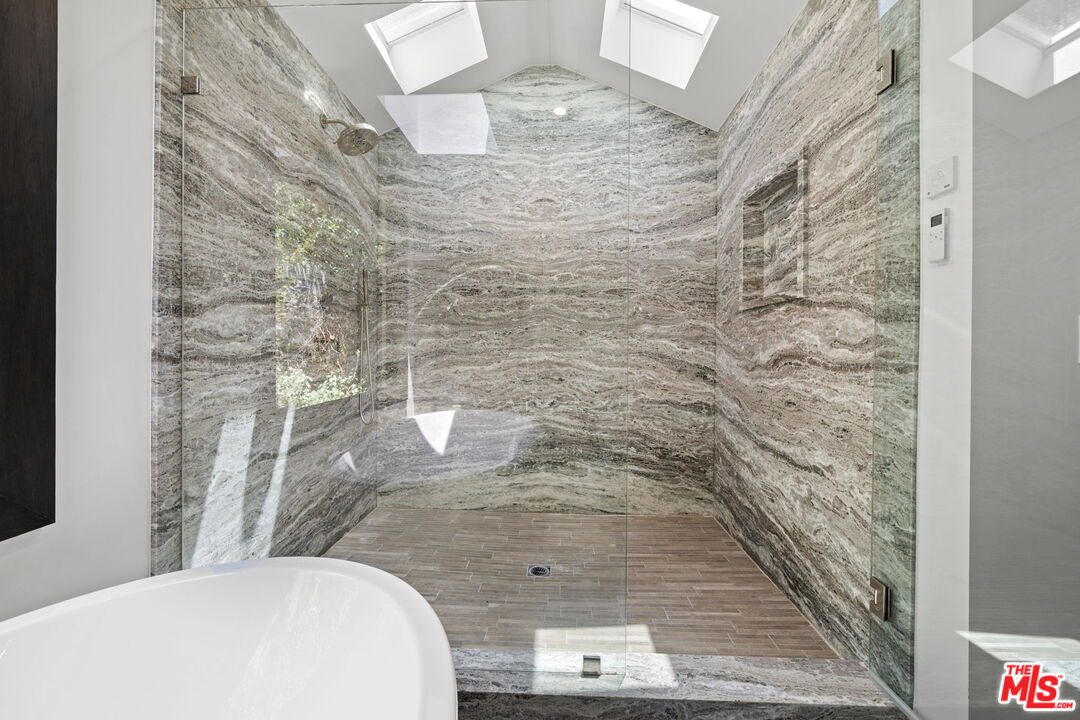 3 Latimer Road Santa Monica, CA 90402 - Photo 17 of 35 a bathroom with a toilet and a shower