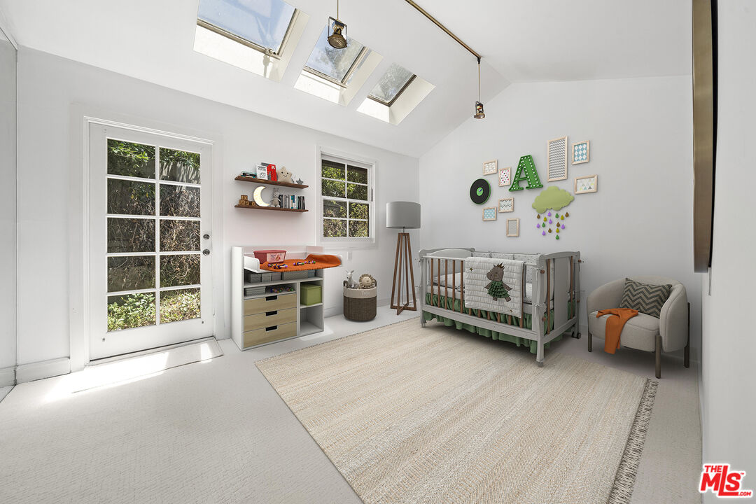 3 Latimer Road Santa Monica, CA 90402 - Photo 20 of 35 a bedroom with furniture and a window