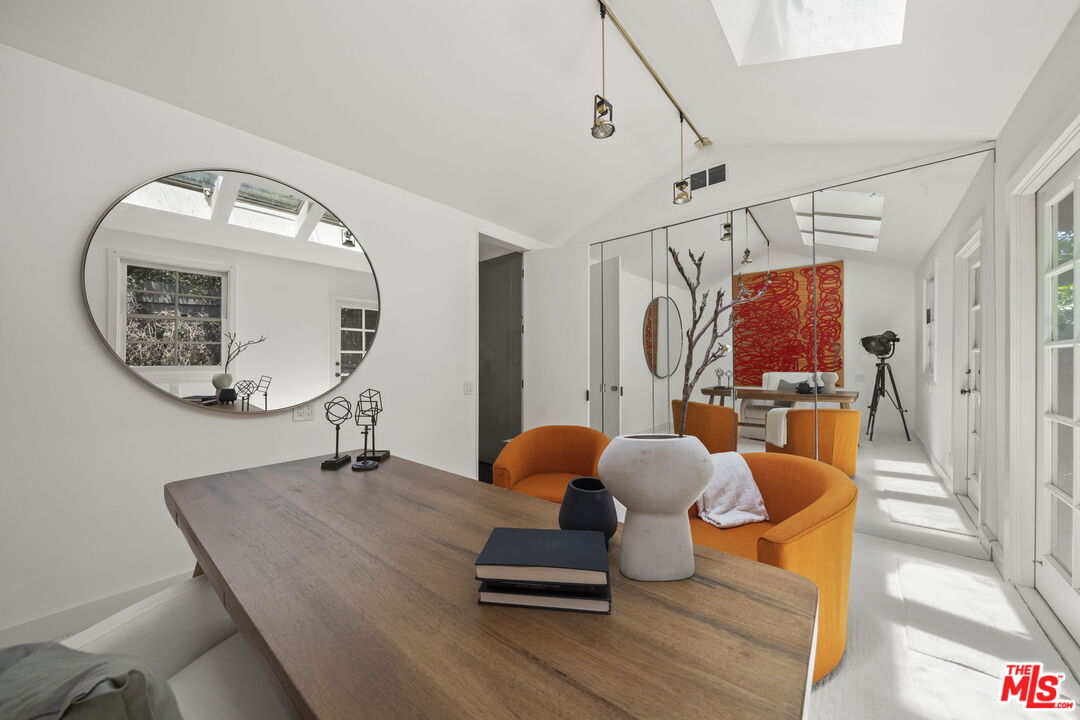 3 Latimer Road Santa Monica, CA 90402 - Photo 21 of 35 a room with furniture and wooden floor