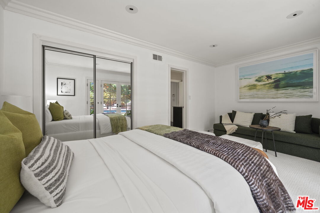 3 Latimer Road Santa Monica, CA 90402 - Photo 23 of 35 a bedroom with a bed and a couch