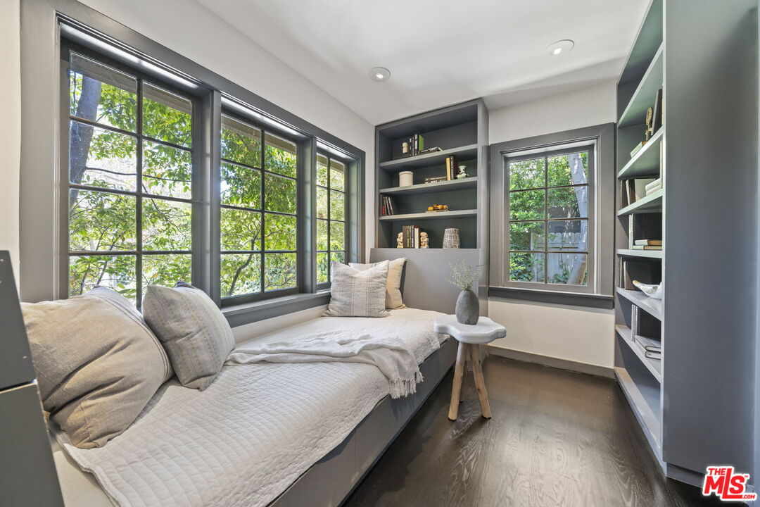 3 Latimer Road Santa Monica, CA 90402 - Photo 27 of 35 a bedroom with a bed and a large window