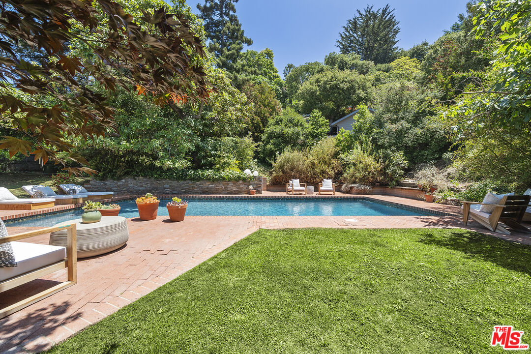 3 Latimer Road Santa Monica, CA 90402 - Photo 31 of 35 a view of swimming pool with chairs