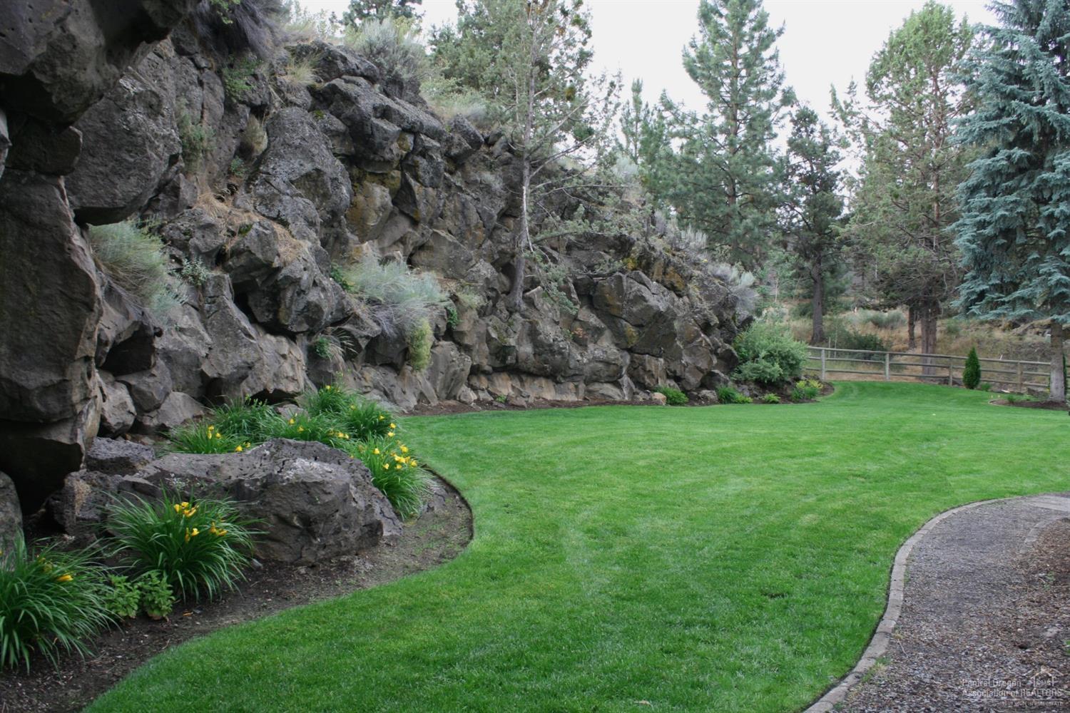20136 Archie Briggs Road Bend, OR 97703 - Photo 20 of 25 A rock wall, approximately 250' long and
