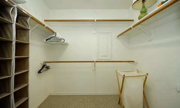 a view of storage and utility room with racks on the wall