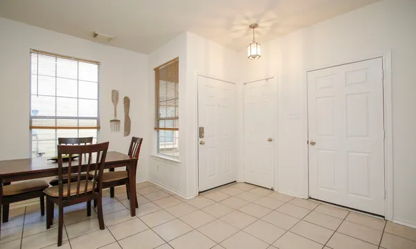 a view of a dining room with furniture