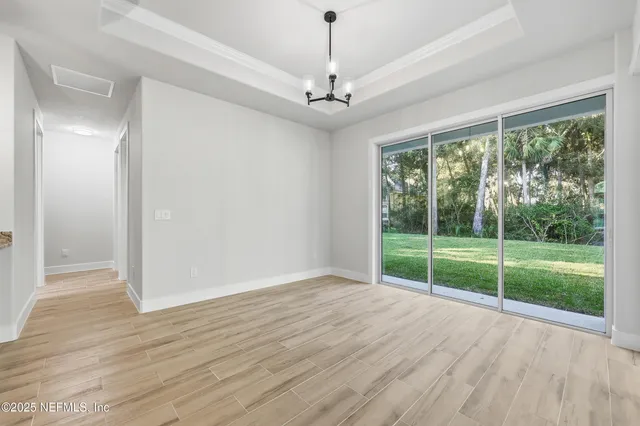 a view of house with a swimming pool