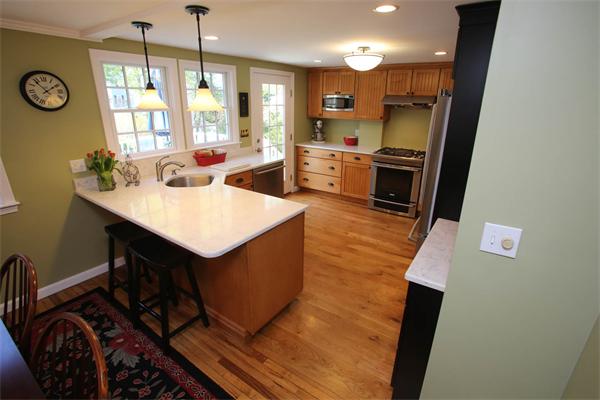 7 Sutherland Road Lexington, MA 02421 - Photo 11 of 22 a kitchen with a sink appliances and cabinets