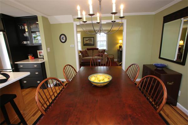 7 Sutherland Road Lexington, MA 02421 - Photo 14 of 22 a view of a dining room with furniture