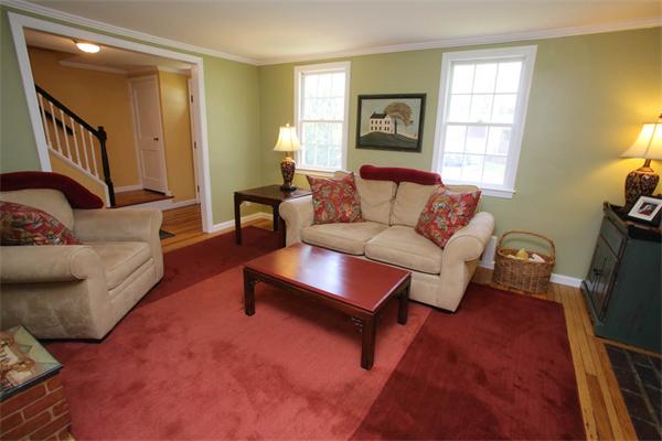7 Sutherland Road Lexington, MA 02421 - Photo 16 of 22 a living room with furniture and a window