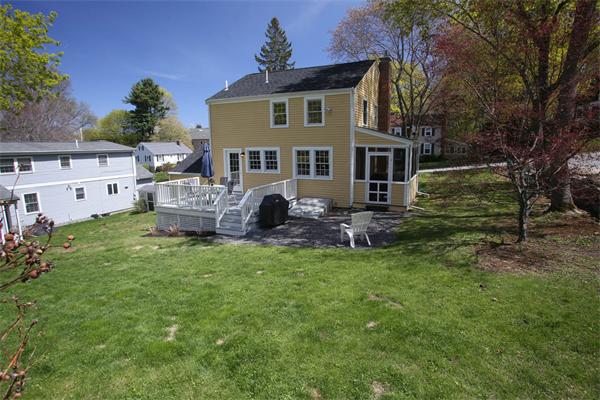 7 Sutherland Road Lexington, MA 02421 - Photo 3 of 22 a view of a house with a garden