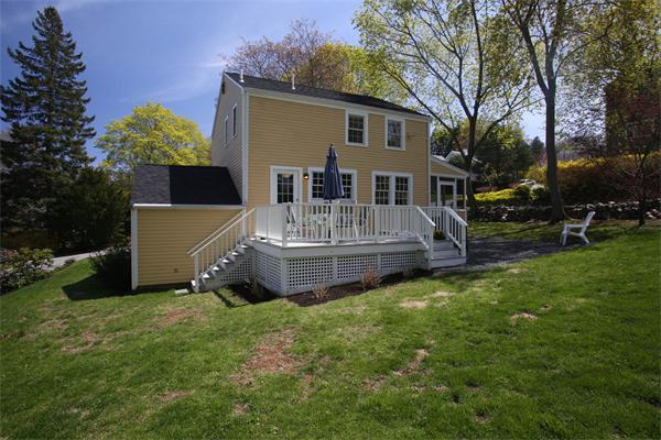 7 Sutherland Road Lexington, MA 02421 - Photo 4 of 22 a view of a house with backyard and sitting area