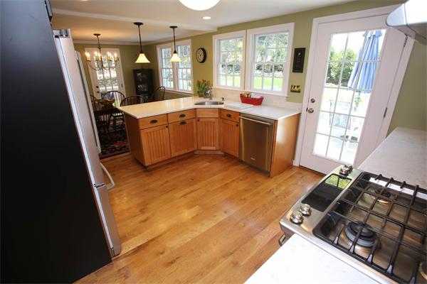 7 Sutherland Road Lexington, MA 02421 - Photo 8 of 22 a kitchen with a sink appliances and cabinets