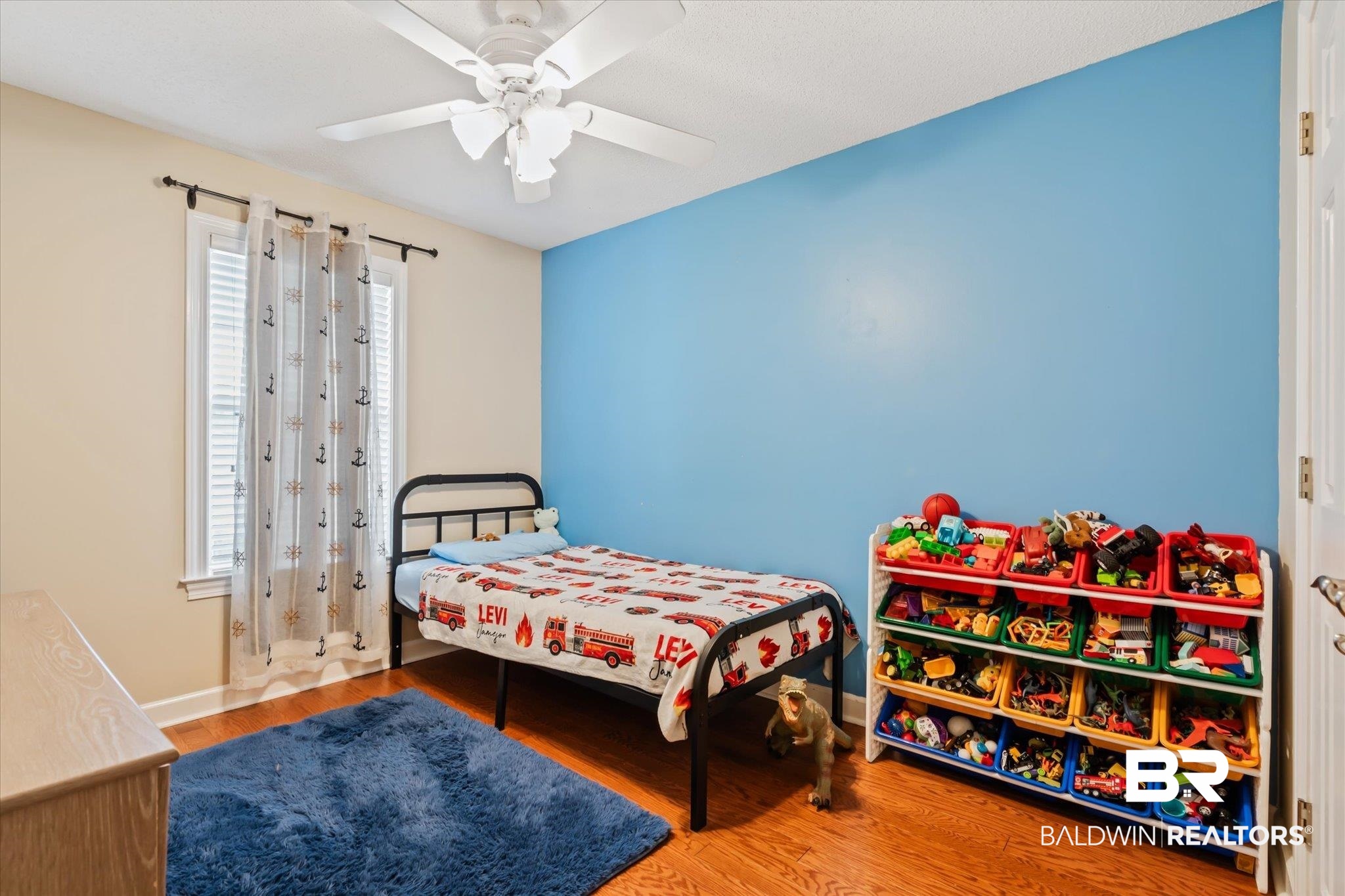 2320 Sequoya Trail Mobile, AL 36695 - Photo 12 of 20 Bedroom with hardwood / wood-style flooring and ceiling fan