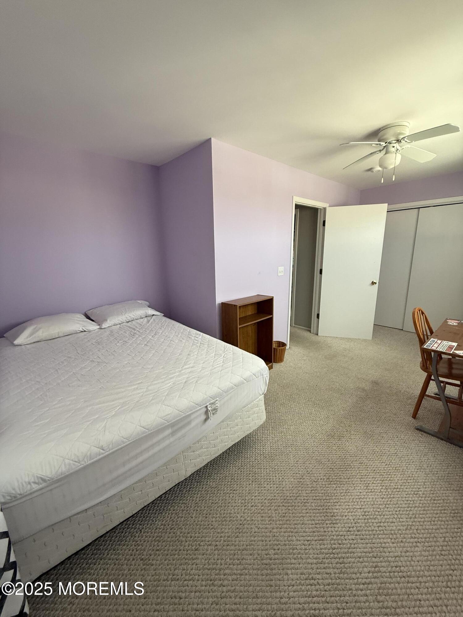 62 A Inlet Drive Point Pleasant Beach, NJ 08742 - Photo 20 of 30 a spacious bedroom with a bed and chair