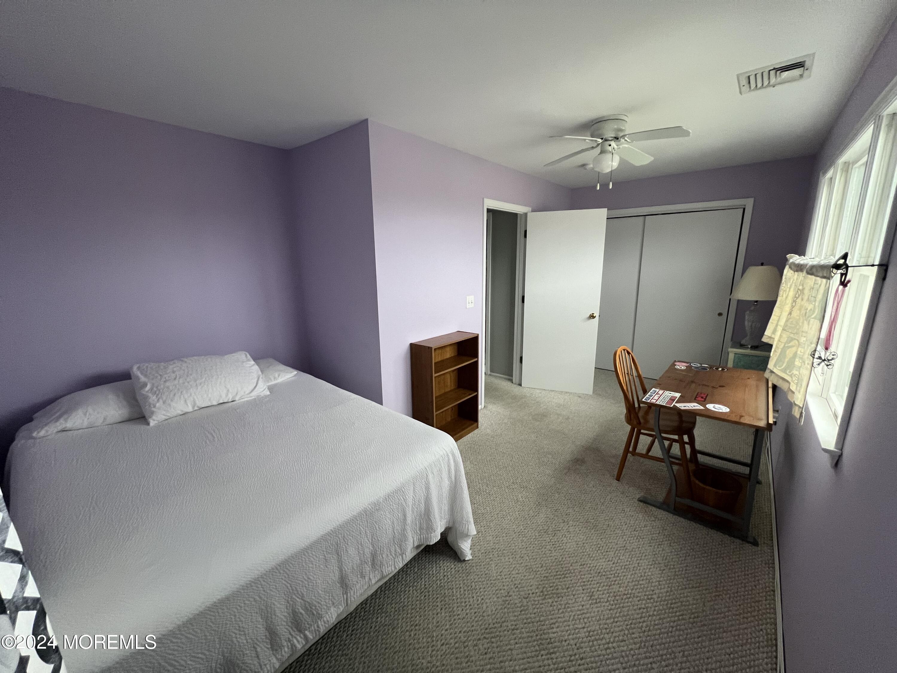 62 A Inlet Drive Point Pleasant Beach, NJ 08742 - Photo 6 of 30 a bedroom with a bed furniture and a chandelier