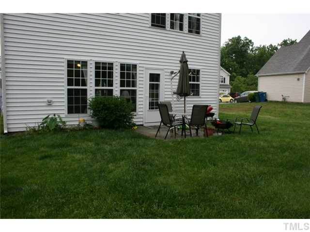 310 Burrell Road Durham, NC 27703 - Photo 15 of 21 Large, flat back yard with a patio for entertaining. Patio/Deck