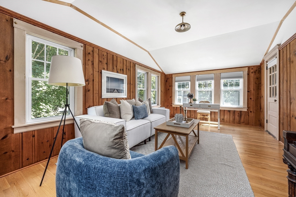22 Linscott Road Hingham, MA 02043 - Photo 3 of 14 a living room with fireplace furniture and a large window