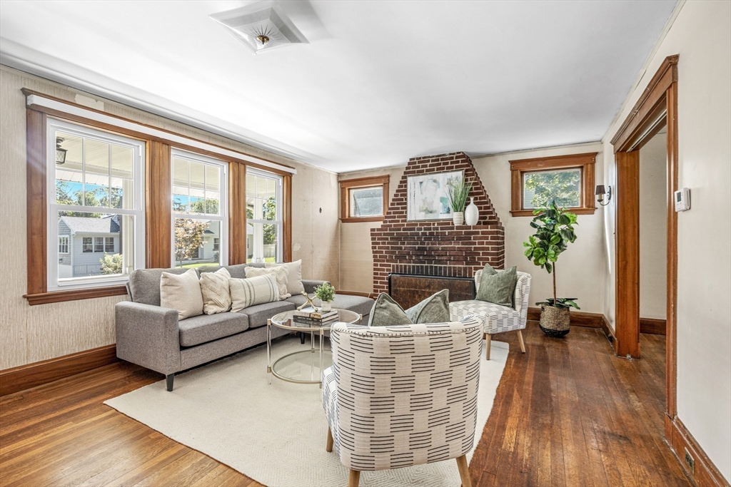 22 Linscott Road Hingham, MA 02043 - Photo 5 of 14 a living room with furniture large window and wooden floor