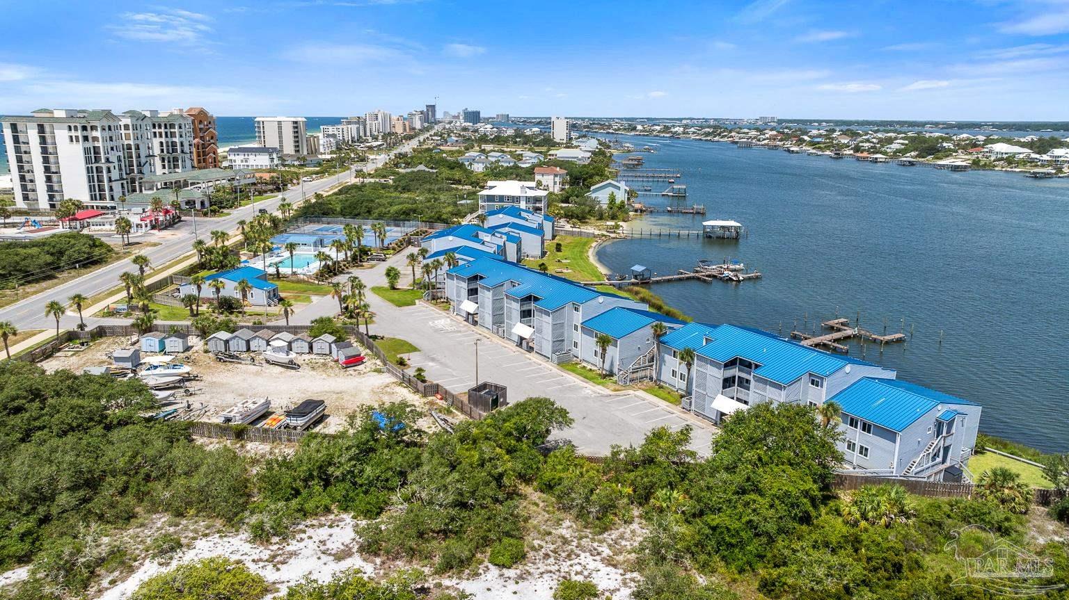 16470 Perdido Key Drive, Unit A 24 Perdido Key, FL 32507 - Photo 2 of 60 an aerial view of a city with lots of residential buildings ocean and mountain view
