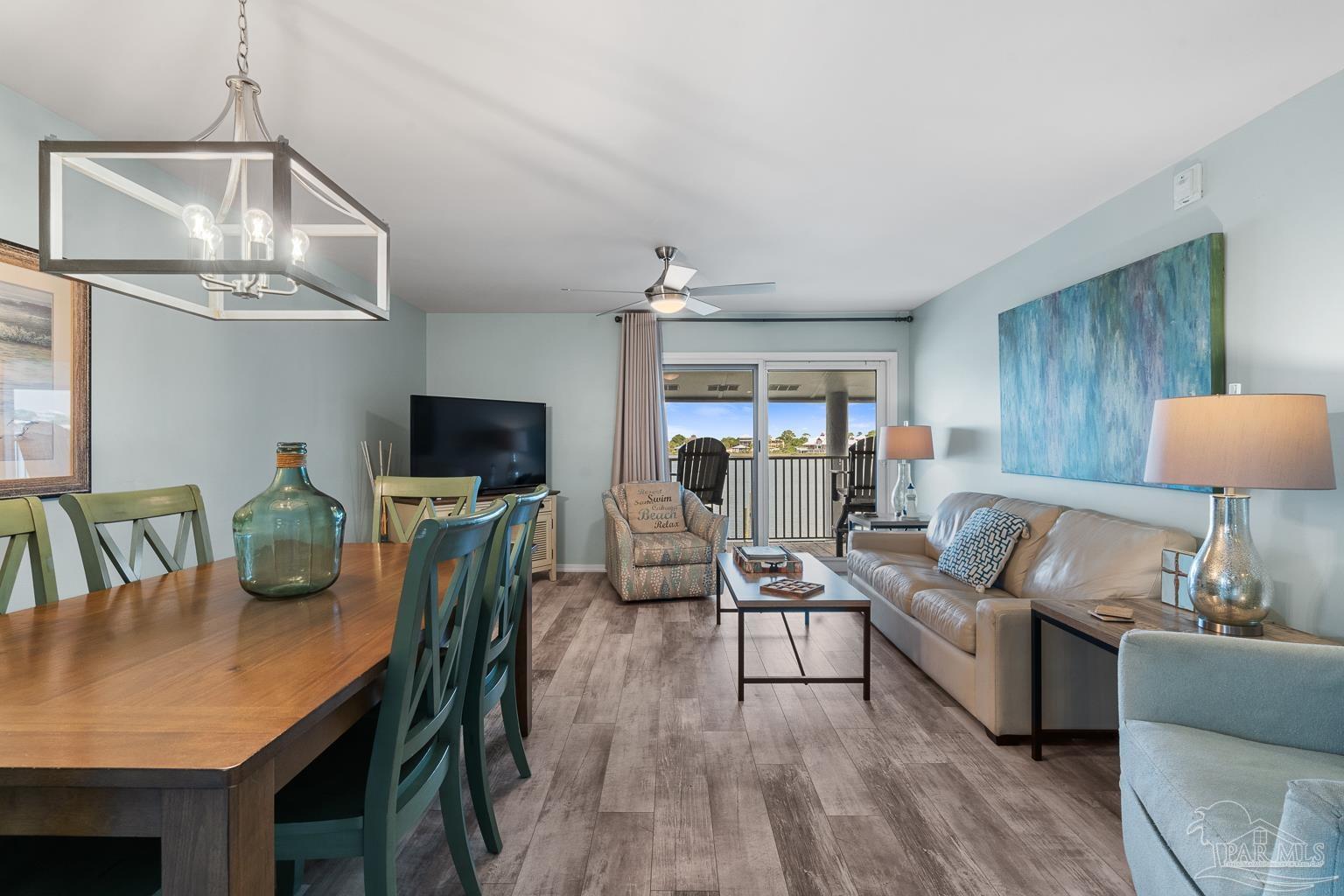 16470 Perdido Key Drive, Unit A 24 Perdido Key, FL 32507 - Photo 3 of 60 a living room with furniture and a flat screen tv