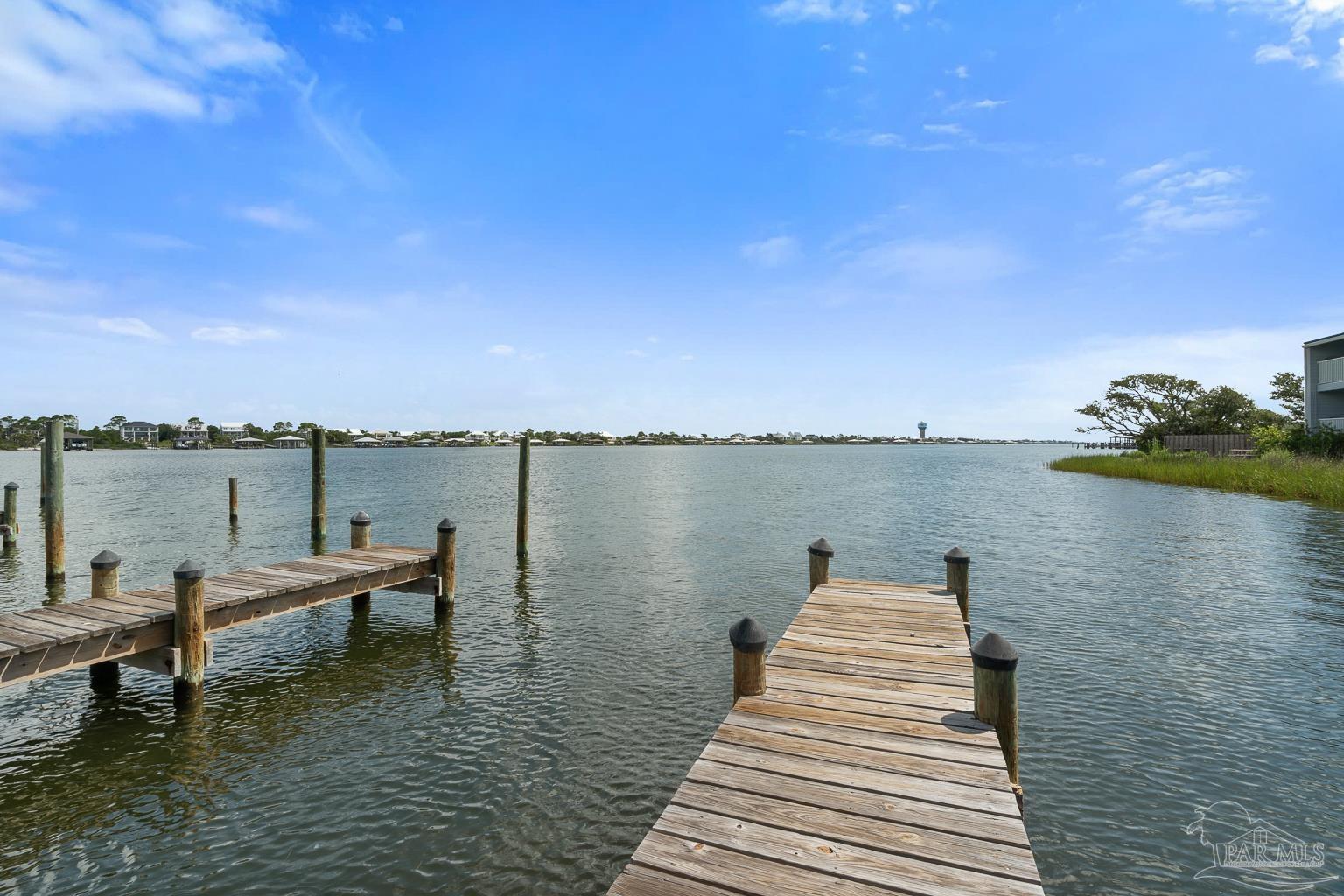16470 Perdido Key Drive, Unit A 24 Perdido Key, FL 32507 - Photo 40 of 60 a view of a lake with chairs