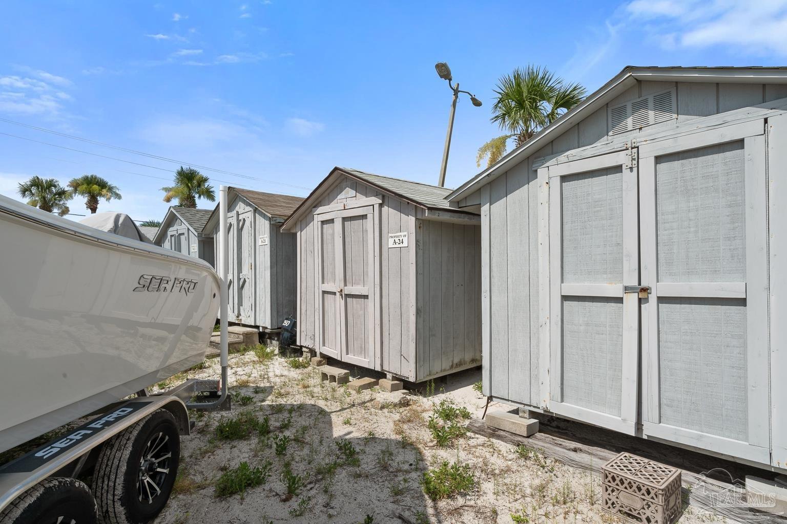 16470 Perdido Key Drive, Unit A 24 Perdido Key, FL 32507 - Photo 46 of 60 a view of a house with a wooden door