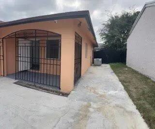 a view of backyard with green space