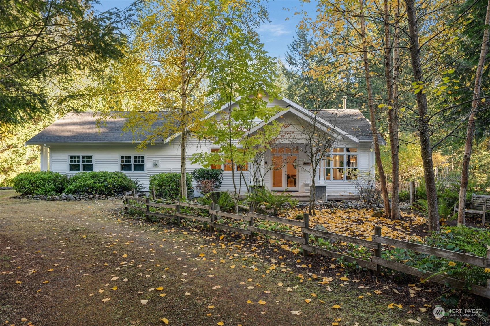 23406 Landers Road Southwest Vashon, WA 98070 - Photo 1 of 39 a front view of a house with a yard