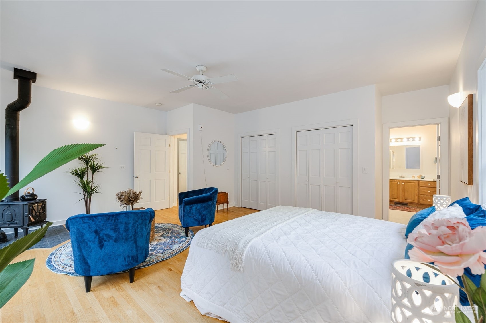 23406 Landers Road Southwest Vashon, WA 98070 - Photo 13 of 39 a bedroom with a bed and a wooden floor
