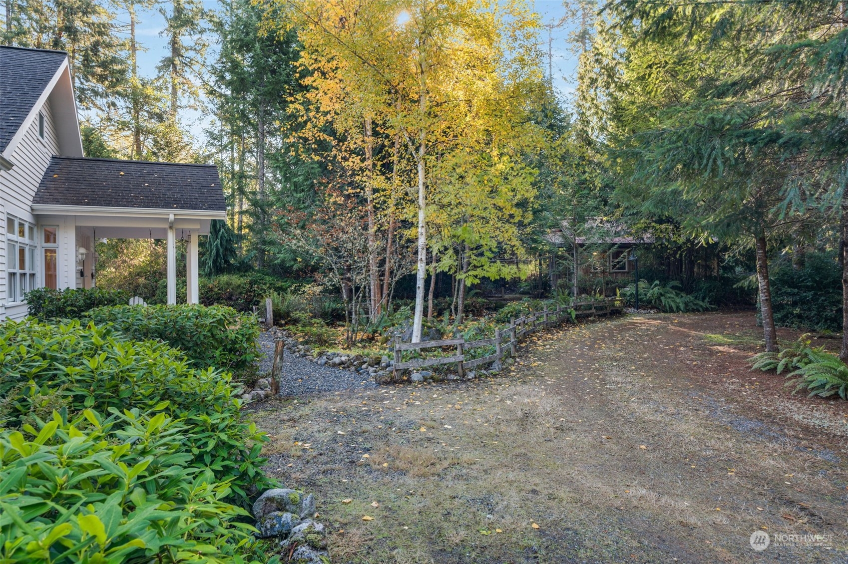 23406 Landers Road Southwest Vashon, WA 98070 - Photo 2 of 39 a backyard of a house with lots of green space